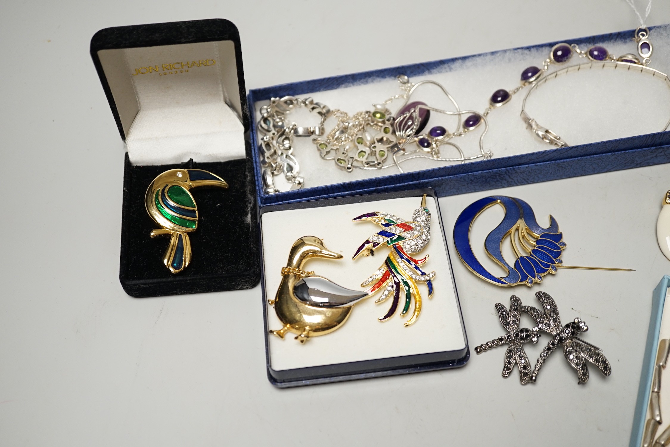 A small quantity of assorted jewellery including costume and a 925 and gem set necklace and two 925 and gem set bracelets, one with cabochon amethysts.